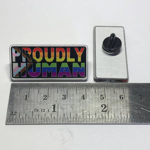 "Proudly Human" acrylic pin
