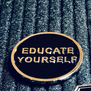 "Educate Yourself" enamel pin by Danny Jarratt