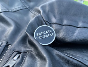 "Educate Yourself" enamel pin by Danny Jarratt